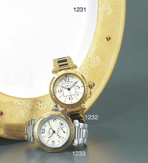 CARTIER. A STAINLESS STEEL AND GOLD SELF-WINDING WRISTWATCH WITH SWEEP CENTRE SECONDS, DATE, POWER RESERVE AND BRACELET