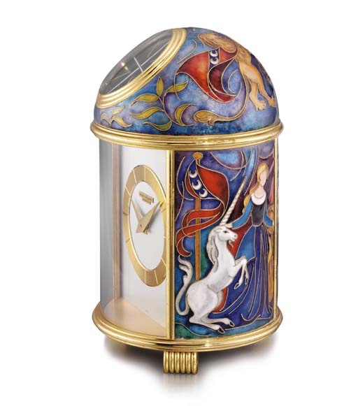Patek Philippe. A fine and possibly unique gilt brass and enamel solar-powered table clock, enamel by Luce Chappaz