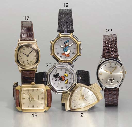 HAMILTON. A 14K GOLD ASYMMETRICAL WRISTWATCH WITH SWEEP CENTER SECONDS