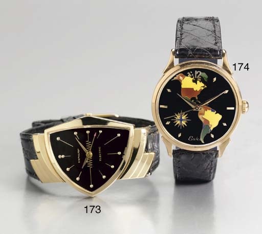 HAMILTON. A 14K GOLD ASYMMETRICAL WRISTWATCH WITH CENTER SECONDS AND BLACK DIAL