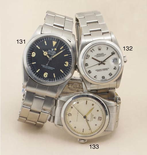 Rolex. A Stainless Steel Midsize Water Resistant Automatic Centre Seconds Calendar Bracelet Watch