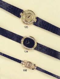 AN 18K GOLD, DIAMOND AND ONYX WRISTWATCH, BY PATEK PHILIPPE