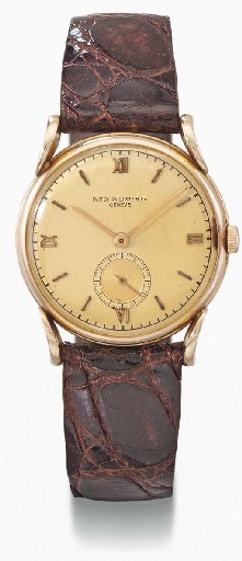 Patek Philippe. A rare and unusual 18K pink gold wristwatch with pink dial