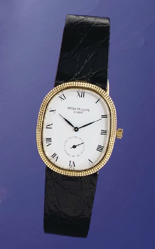 PATEK PHILIPPE. AN 18K GOLD CUSHION WRISTWATCH