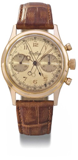 Breitling. A rare and large 18K pink gold waterproof split seconds chronograph wristwatch with champagne dial