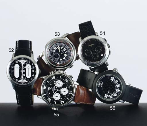 GERALD GENTA. A STAINLESS STEEL AND RUBBER AUTOMATIC JUMP HOUR WRISTWATCH WITH CENTER SECONDS AND RETROGRADE MINUTES