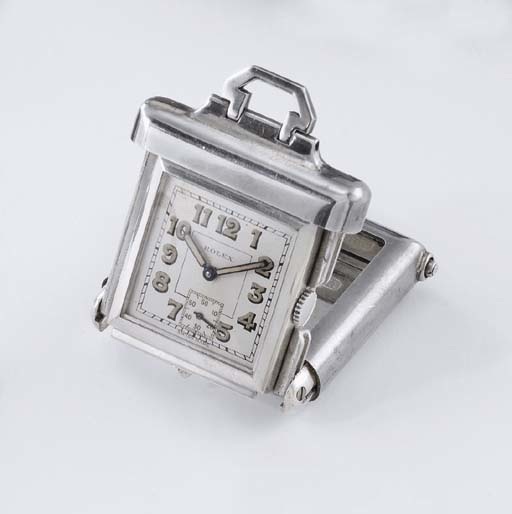Rolex. An unusual silver purse watch