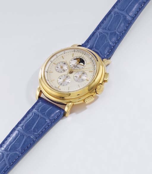 Ulysse Nardin. A fine and large 18K gold chronograph wristwatch with date and phases of the moon
