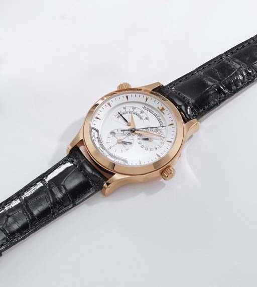 Jaeger-LeCoultre. An 18K pink gold self-winding dual time wristwatch with world time indication, sweep centre seconds, date and up and down indicator