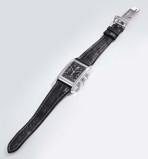 Audemars Piguet. A fine and large 18K white gold rectangular self-winding chronograph wristwatch with date