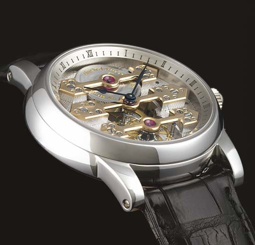 GIRARD-PERREGAUX. A FINE AND RARE PLATINUM TOURBILLON WRISTWATCH