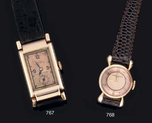 Rolex. A 18ct Pink Gold Rectangular Wristwatch with Articulated lugs