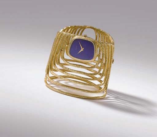 Piaget. An unusual and rare 18K gold bangle wristwatch with jade dial