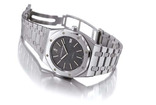 Audemars Piguet. A large stainless steel limited edition self-winding water-resistant wristwatch with date, bracelet and glazed back
