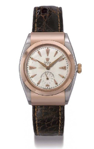 Rolex. A fine and rare stainless steel and 18K pink gold self-winding water-resistant bubble back wristwatch with sweep centre seconds and hooded lugs