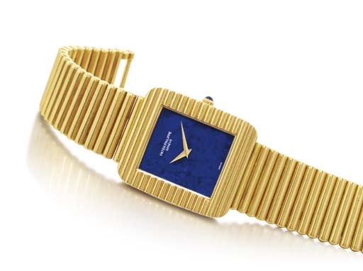 PATEK PHILIPPE. AN 18K GOLD RECTANGULAR WRISTWATCH WITH BRACELET AND LAPIS LAZULI DIAL