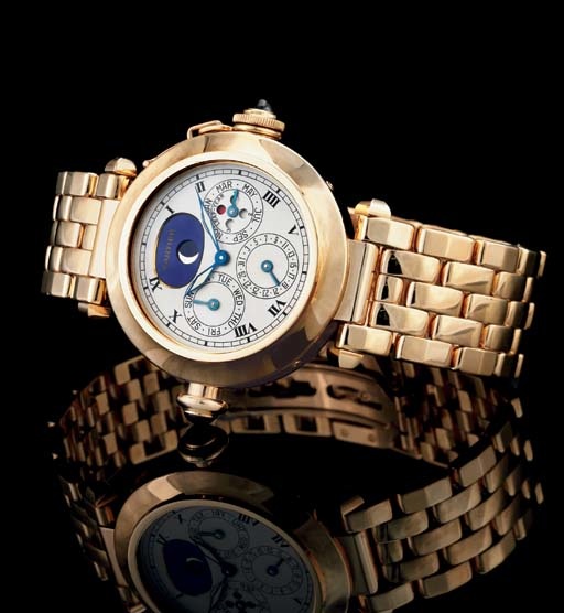 CARTIER. A FINE AND RARE 18K GOLD AUTOMATIC MINUTE REPEATING PERPETUAL CALENDAR WRISTWATCH WITH MOON PHASES