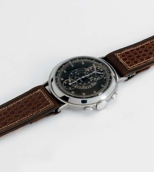 Rolex. An extremely fine and rare stainless steel chronograph wristwatch with black regulator dial