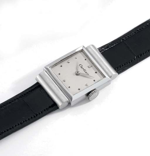 Patek Philippe. A fine, rare and unusual platinum square wristwatch with hooded lugs