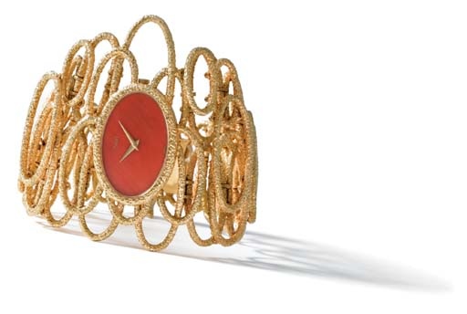 Piaget. A highly unusual 18K gold and coral bracelet watch