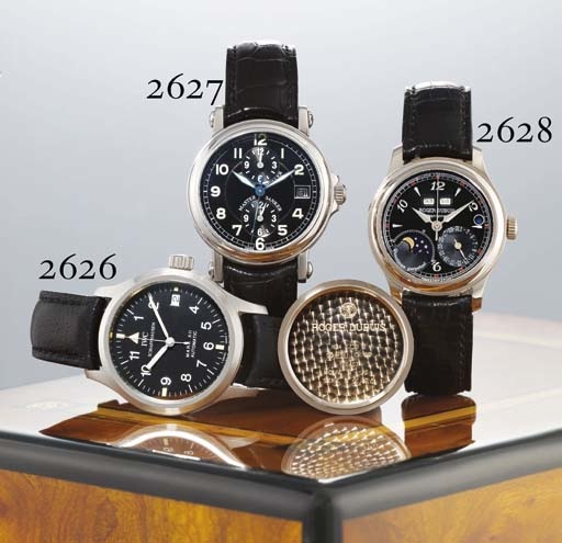 FRANCK MULLER. A STAINLESS STEEL AUTOMATIC TRIPLE TIME ZONE WRISTWATCH WITH CENTRE SECONDS AND DATE