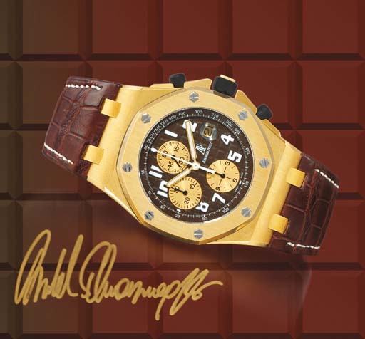 AUDEMARS PIGUET. A RARE OVERSIZED LIMITED EDITION 18K GOLD TONNEAU-SHAPED AUTOMATIC CHRONOGRAPH WRISTWATCH WITH DATE