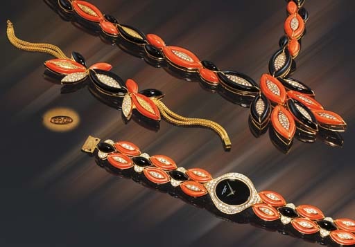 PATEK PHILIPPE. A VERY RARE LADY'S AND PROBABLY UNIQUE SUITE OF AN 18K GOLD, DIAMOND, ONYX AND CORAL BRACELET WATCH TOGETHER WITH MATCHING NECKLACE AND BRACELET