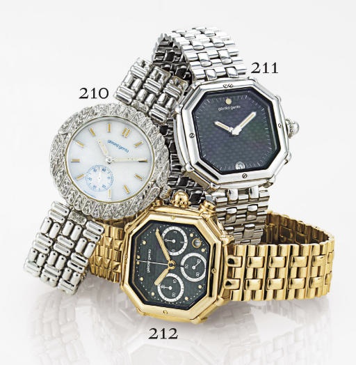 GERALD GENTA. AN 18K WHITE GOLD OCTAGONAL AUTOMATIC BRACELET WATCH WITH DATE