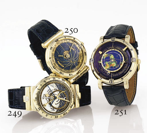 ULYSSE NARDIN. A FINE LIMITED EDITION 18K GOLD AUTOMATIC DUAL TIME ASTRONOMICAL WRISTWATCH