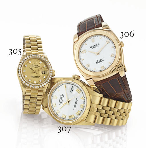 ROLEX. AN 18K GOLD AUTOMATIC WRISTWATCH WITH CENTER SECONDS, DATE AND BRACELET