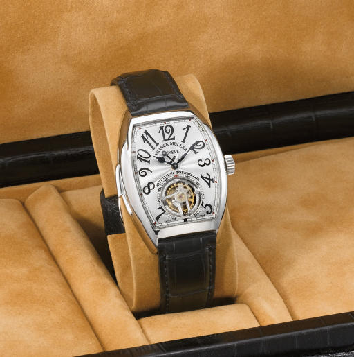 Franck Muller. A very fine, large and rare platinum tonneau-shaped curved minute repeating wristwatch with power reserve and one minute tourbillon