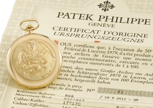 Patek Philippe. A very fine and rare 18K gold limited edition hunter case keyless lever watch with gold relief by Hans Erni and original certificate, made for the 50th target shooting contest in Lucerne in 1979