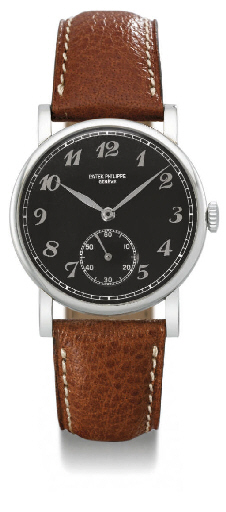 Patek Philippe. A very fine, rare and unusual stainless steel wristwatch with black dial and Breguet numerals