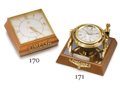 Omega. An unusual gilt brass and elox 8-day display desk clock with sweep centre seconds, made for the Swedish Market