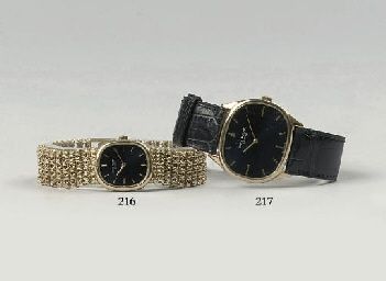 AN 18K GOLD LADY'S OVAL WRISTWATCH, BY PATEK PHILIPPE