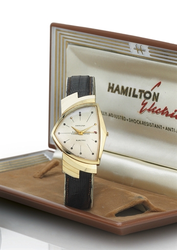 HAMILTON. AN OVERSIZED 14K GOLD ASYMMETRICAL WRISTWATCH WITH CENTER SECONDS