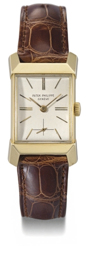 Patek Philippe. A fine and rare 18K gold rectangular wristwatch with unusual facetted lugs