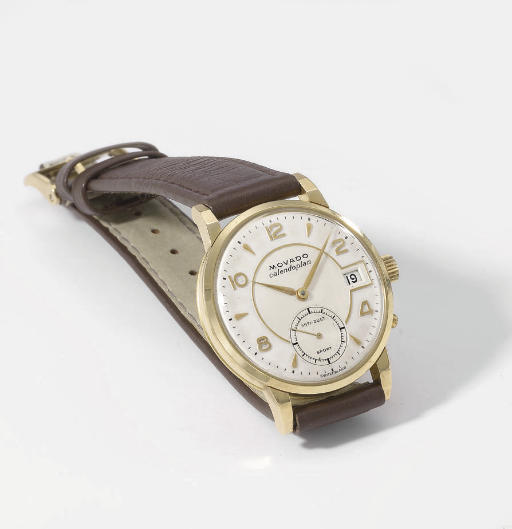 Movado. An 18K gold wristwatch with two-tone silvered dial and date