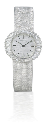 PATEK PHILIPPE, REF. 3393/1.LADY'S 18K WHITE GOLD AND DIAMOND-SET MANUAL-WINDING OVAL-SHAPED BRACELET WATCH