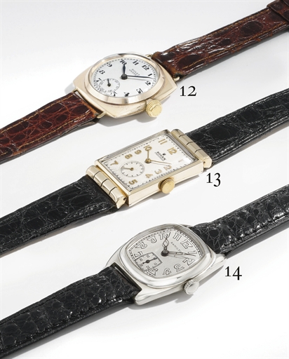 Rolex. A 9K gold rectangular curved wristwatch with hooded lugs