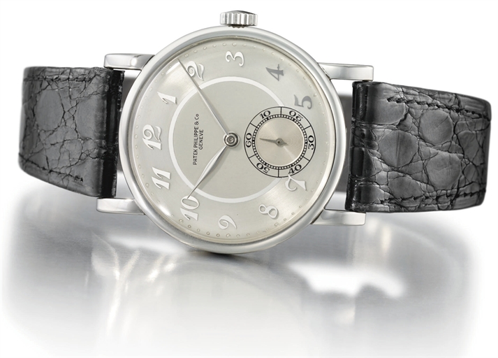 Patek Philippe. An extremely attractive and rare stainless steel wristwatch with two-tone silver dial and Breguet numerals