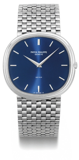 Patek Philippe. An 18K white gold cushion-shaped automatic wristwatch with bracelet