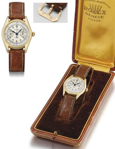 Rolex. A very fine, rare and small 18K gold single button chronograph wristwatch with two-tone silvered dial