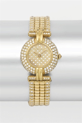 Cartier. A lady's 18K gold and diamond-set wristwatch with bracelet