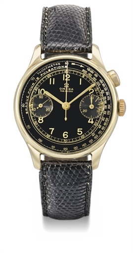 Omega. A fine and rare 14K gold chronograph wristwatch with black dial and pulsometre