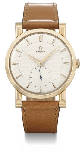 Omega. A fine, large and unusual 18K pink gold wristwatch with honeycomb dial