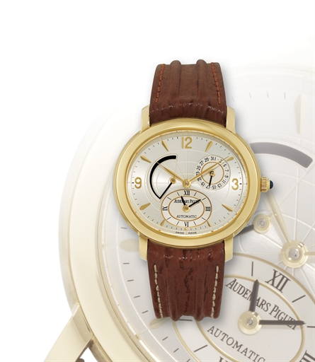 AUDEMARS PIGUET, MILLENARY.YELLOW GOLD AUTOMATIC DUAL TIME WRISTWATCH WITH DATE AND POWER RESERVE INDICATION