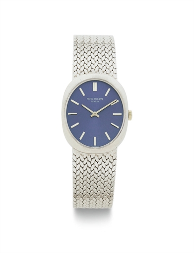 PATEK PHILIPPE. AN 18K WHITE GOLD WRISTWATCH WITH BRACELET