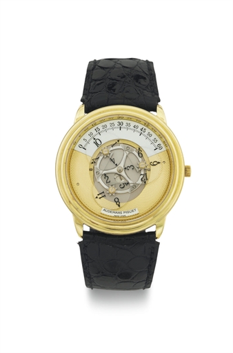 AUDEMARS PIGUET. AN 18K GOLD AUTOMATIC WANDERING HOUR WRISTWATCH