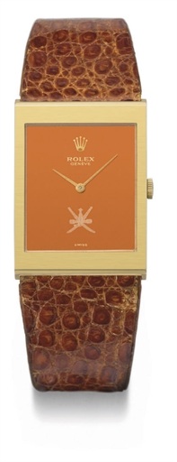 Rolex. An 18K gold rectangular wristwatch